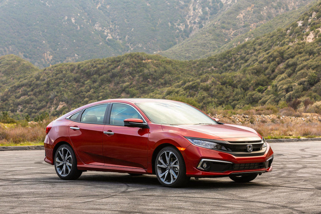 For 2019, the Honda Civic compact sedan’s exterior has been tweaked to impart greater visual impact, including lower bumpers with chrome accents and blacked-out headlight treatments. (Manufacturer photo)
