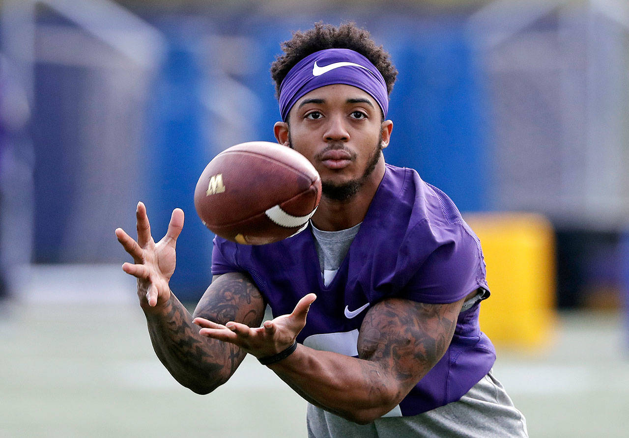 Washington’s Chico McClatcher participates in a drill during a March 28, 2018 practice in Seattle. (AP Photo/Elaine Thompson)