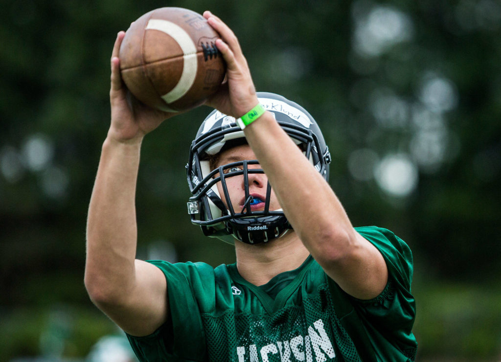 Jackson’s Luke Marklund catches the ball during a drill. (Olivia Vanni / The Herald)
