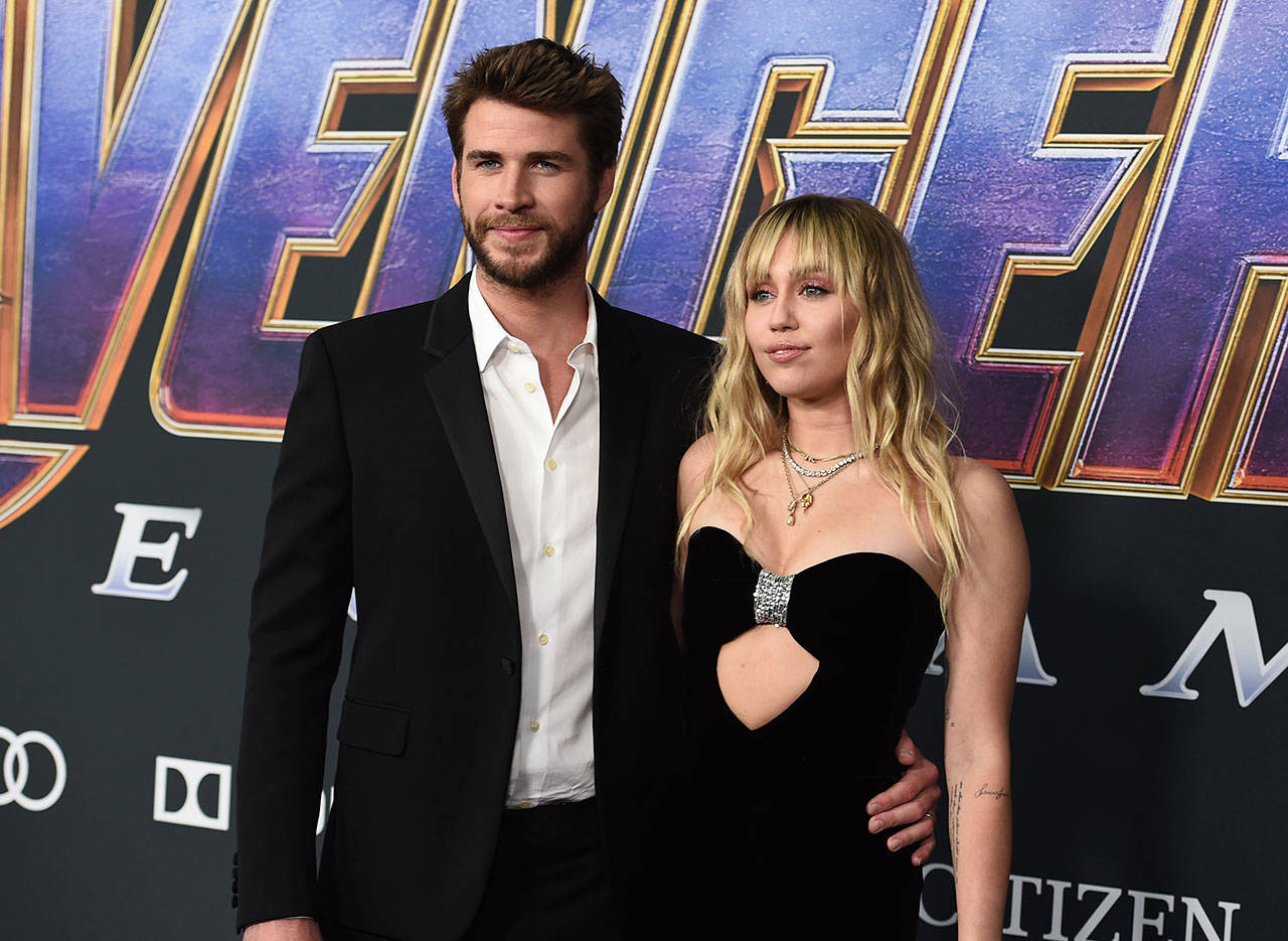 Liam Hemsworth and Miley Cyrus arrive at the premiere of “Avengers: Endgame” at the Los Angeles Convention Center in April. (Photo by Jordan Strauss/Invision/AP, File)
