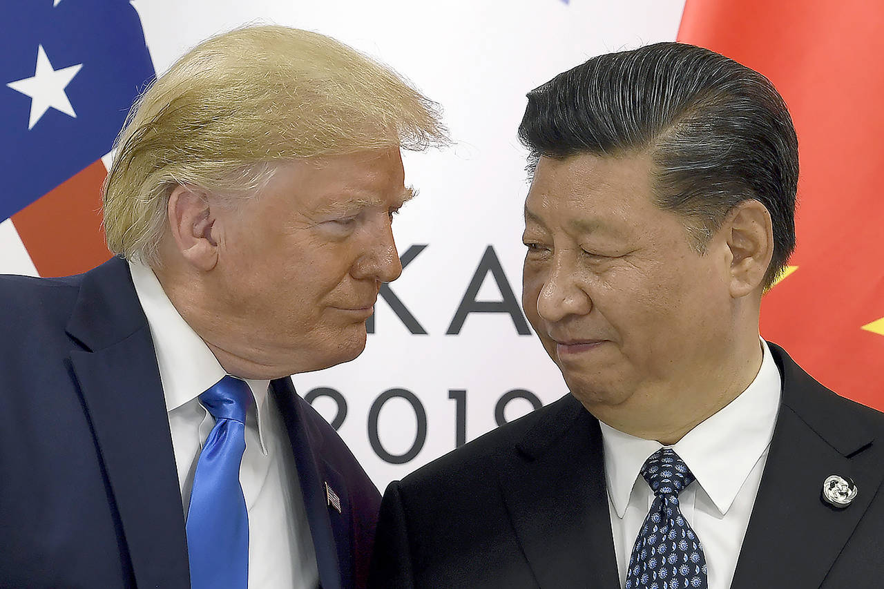 In this June 29 photo, President Donald Trump meets with Chinese President Xi Jinping during a meeting on the sidelines of the G-20 summit in Osaka, Japan. (AP Photo/Susan Walsh, File)
