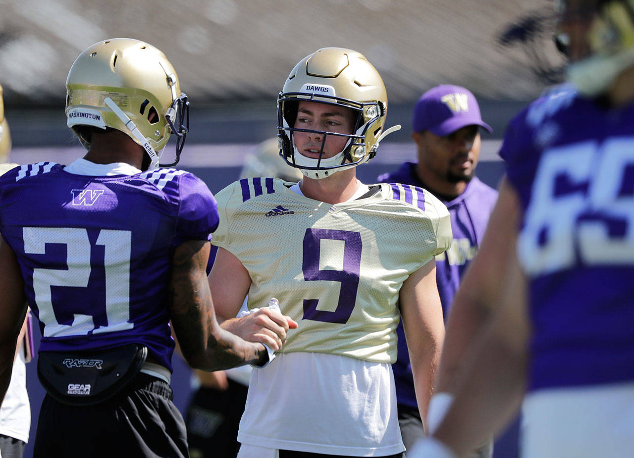 After losing the battle to be the starting quarterback, Washington announced Saturday that Jake Haener (9) left the football program. (AP Photo/Elaine Thompson)