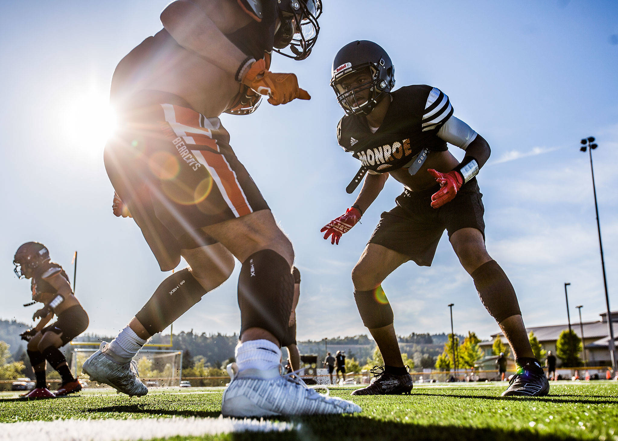 Monroe senior J.R. Little runs through a drill during practice Wednesday at Monroe High School. (Olivia Vanni / The Herald)
