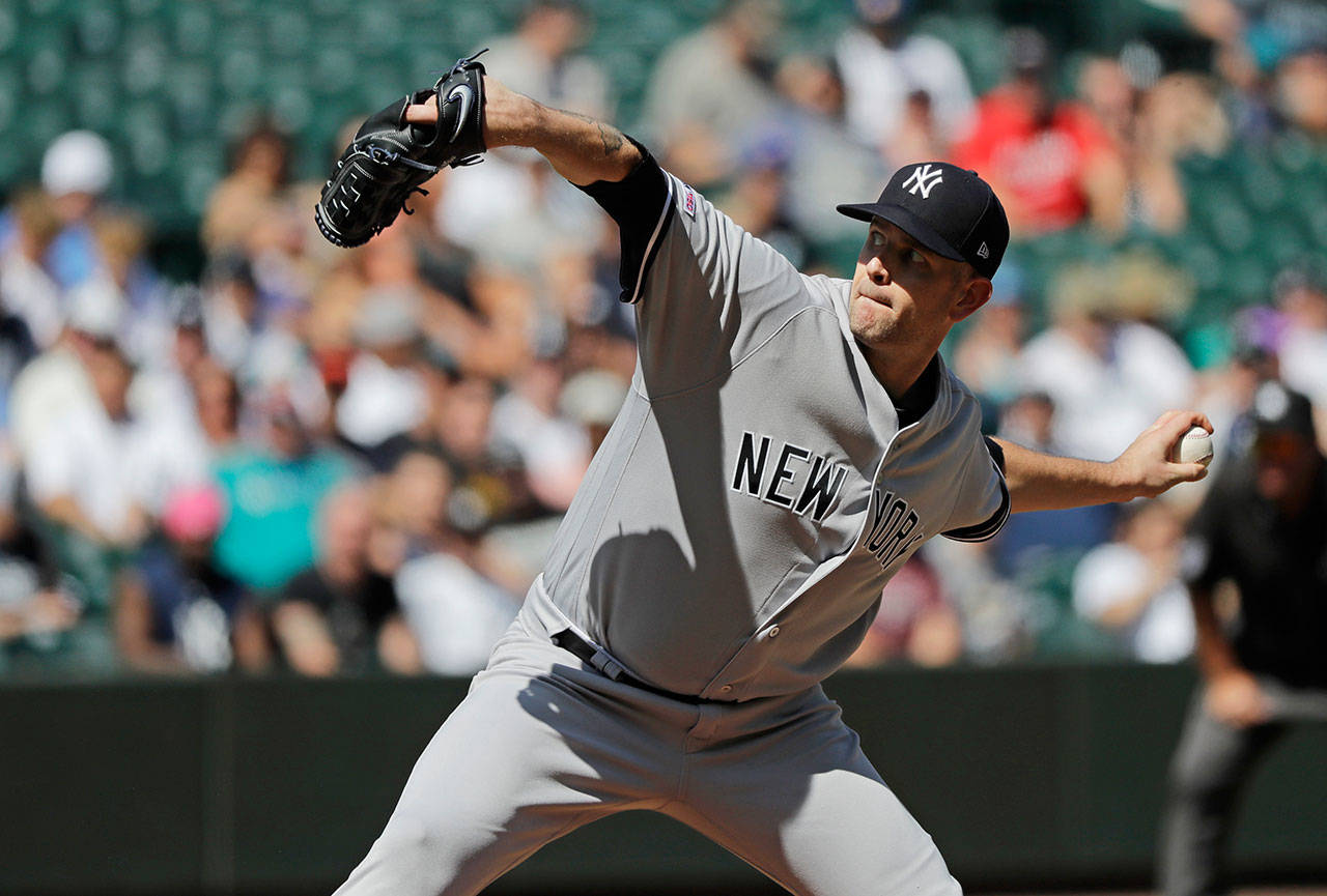 Yankees starting pitcher James Paxton throws against the Mariners during the first inning of a game on Aug. 28, 2019, in Seattle. (AP Photo/Ted S. Warren)
