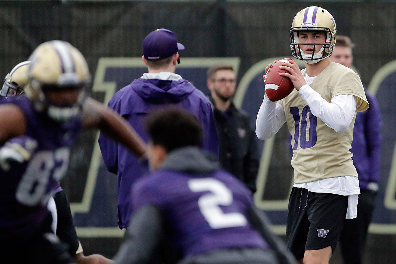 Voters expect University of Washington quarterback and Lake Stevens High School graduate Jacob Eason to have a big season. (AP Photo/Ted S. Warren)