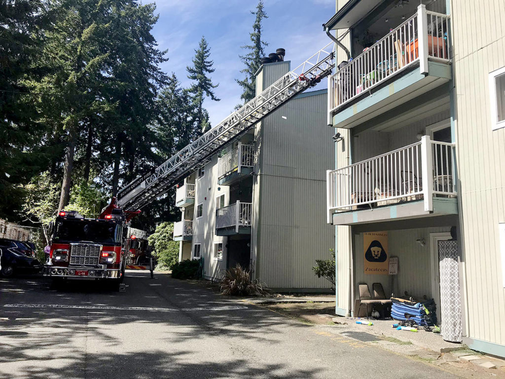 Fire was contained to the attic of a 3-story apartment building in the 5800 block of 200th St SW in Lynnwood on Wednesday. A second fire at the same place Thursday morning caused more damage and displaced 10 people . (South County Fire)
