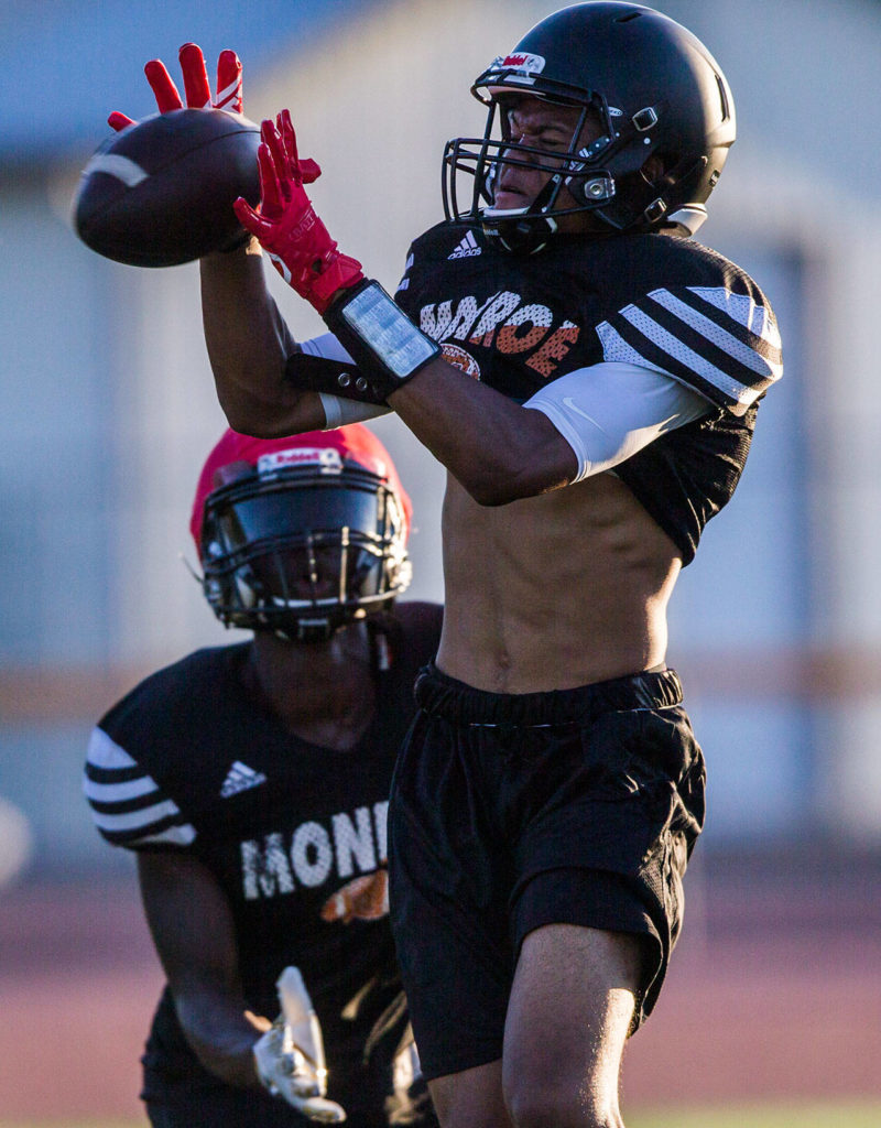 J.R. Little makes a catch during football practice at Monroe High School on Wednesday, Aug. 28, 2019 in Monroe, Wash. (Olivia Vanni / The Herald)
