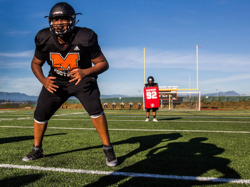 Griffin Montana waits for the whistle during a drill at football practice at Monroe High School on Wednesday, Aug. 28, 2019 in Monroe, Wash. (Olivia Vanni / The Herald)
