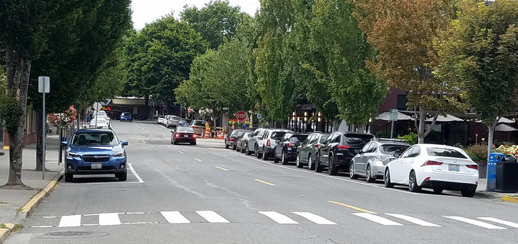 Parked cars line Fifth Avenue in downtown Edmonds on Thursday afternoon. (Sharon Salyer / The Herald)

