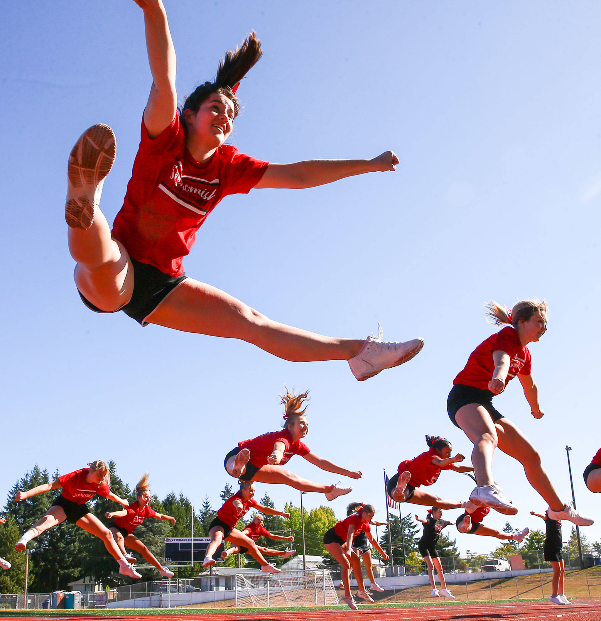 The 2019-20 Snohomish High cheerleaders practice at Veterans Memorial Stadium in Snohomish on Aug. 27. (Kevin Clark / The Herald)