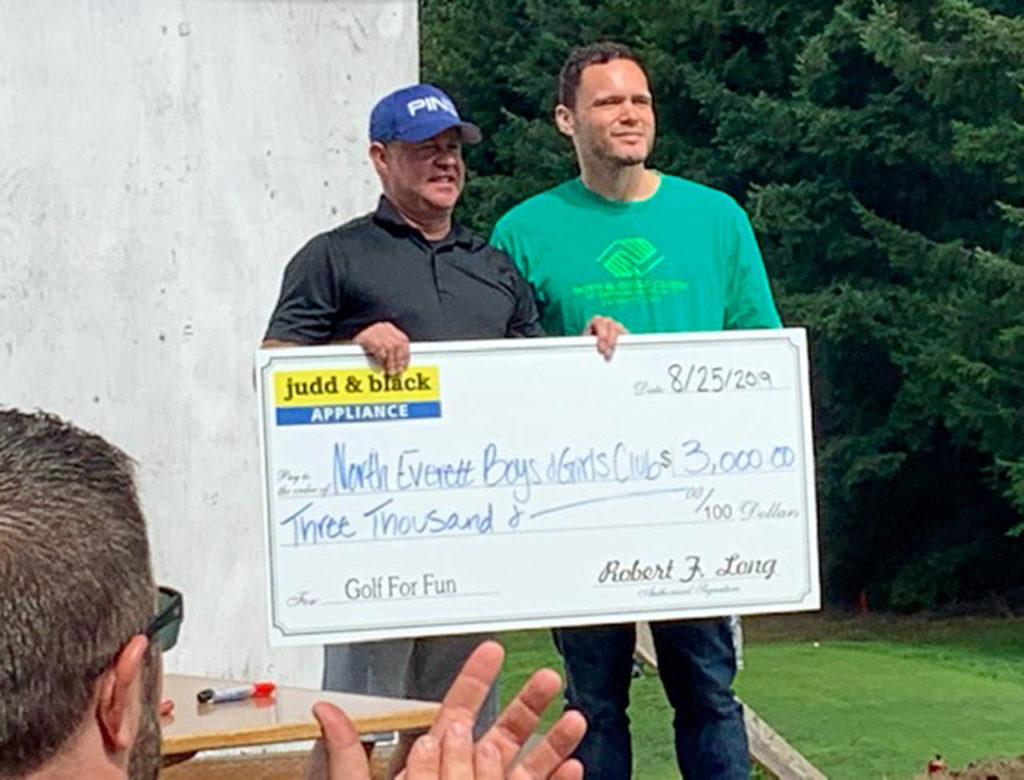 Judd & Black delivered a $3,000 check to the North Everett Boys & Girls Club.
