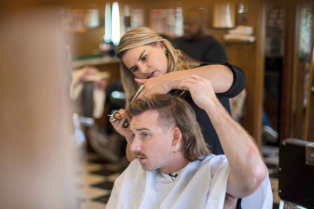 Wallen, 26, receives a mullet at Paul Mole Barber Shop in New York.
