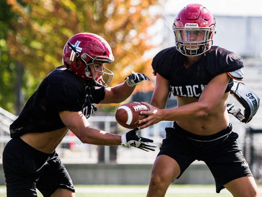 Quarterback Victor Gabalis (right) and running back Mason Mathis aim to lead Archbishop Murphy back to the state playoffs after falling short last season. (Olivia Vanni / The Herald)
