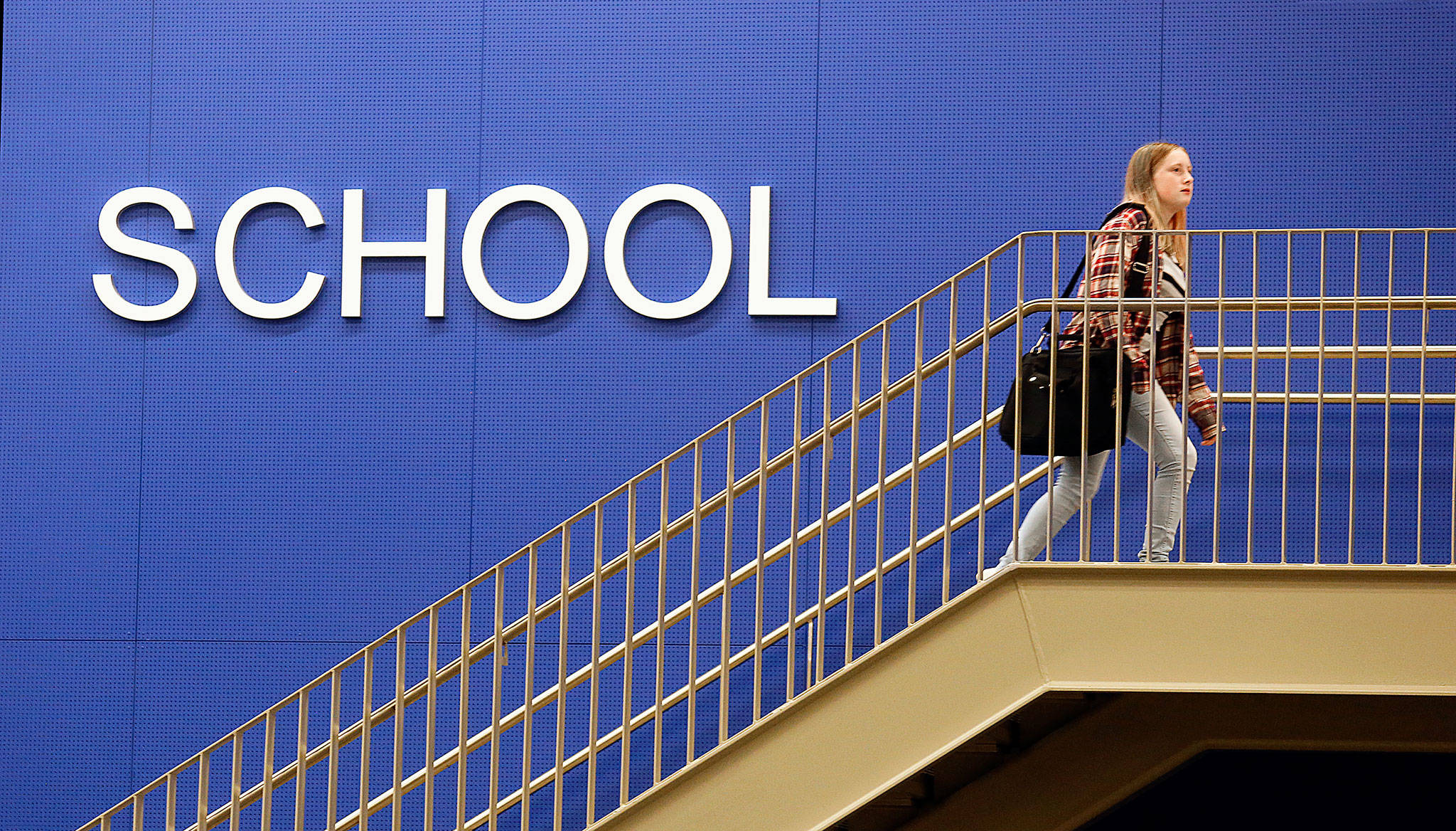 A renovated North Middle School greets students Wednesday as they return to school. The $50 million project, not fully completed, includes 30 new classrooms, expanded parking and upgrades to the track, field, gym and music rooms. (Dan Bates / The Herald)