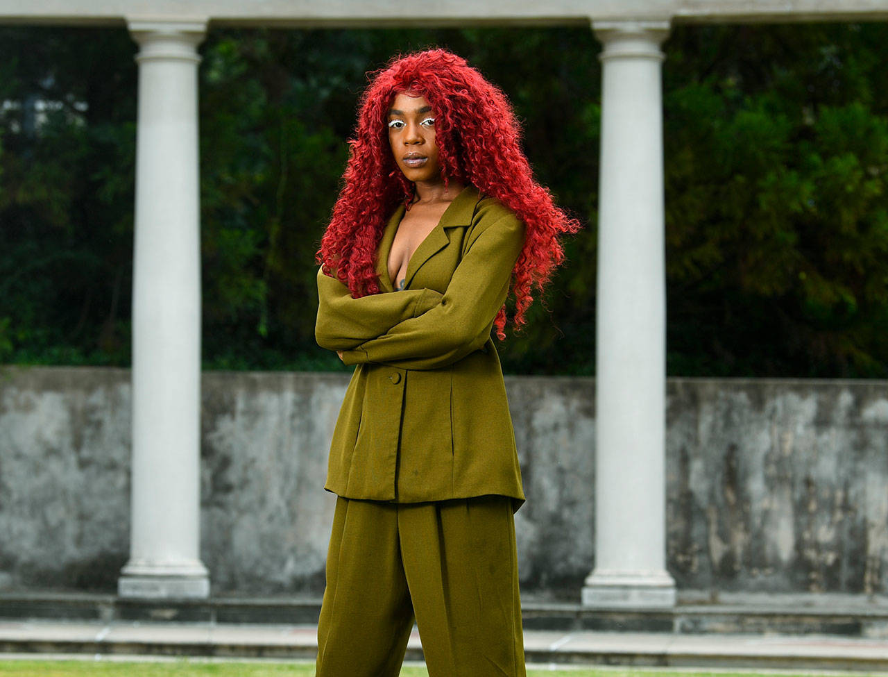 This Aug. 19, 2019 photo shows music artist Buku Abi, born Joann Kelly, posing in Atlanta. As the daughter of R. Kelly, she experienced her fair share of hardships. She is no longer in touch with him and says being R. Kelly’s daughter is like “a double-edged sword.” In March, Abi released her debut EP “Don’t Call Me” and she appeared on the WEtv reality series, “Growing Up Hip Hop: Atlanta.” (AP Photo/John Amis)
