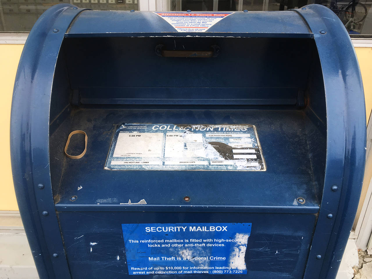 The mailbox in front the of Everett Post Office shows a pickup time of 5 p.m. (Sue Misao / The Herald)