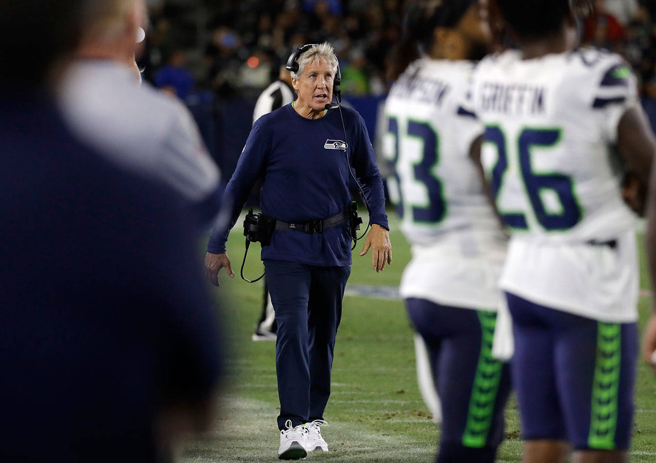 Seahawks head coach Pete Carroll looks up at the scoreboard during the second half of a preseason game against the Chargers on Aug. 25, 2019, in Carson, California. (AP Photo/Alex Gallardo)