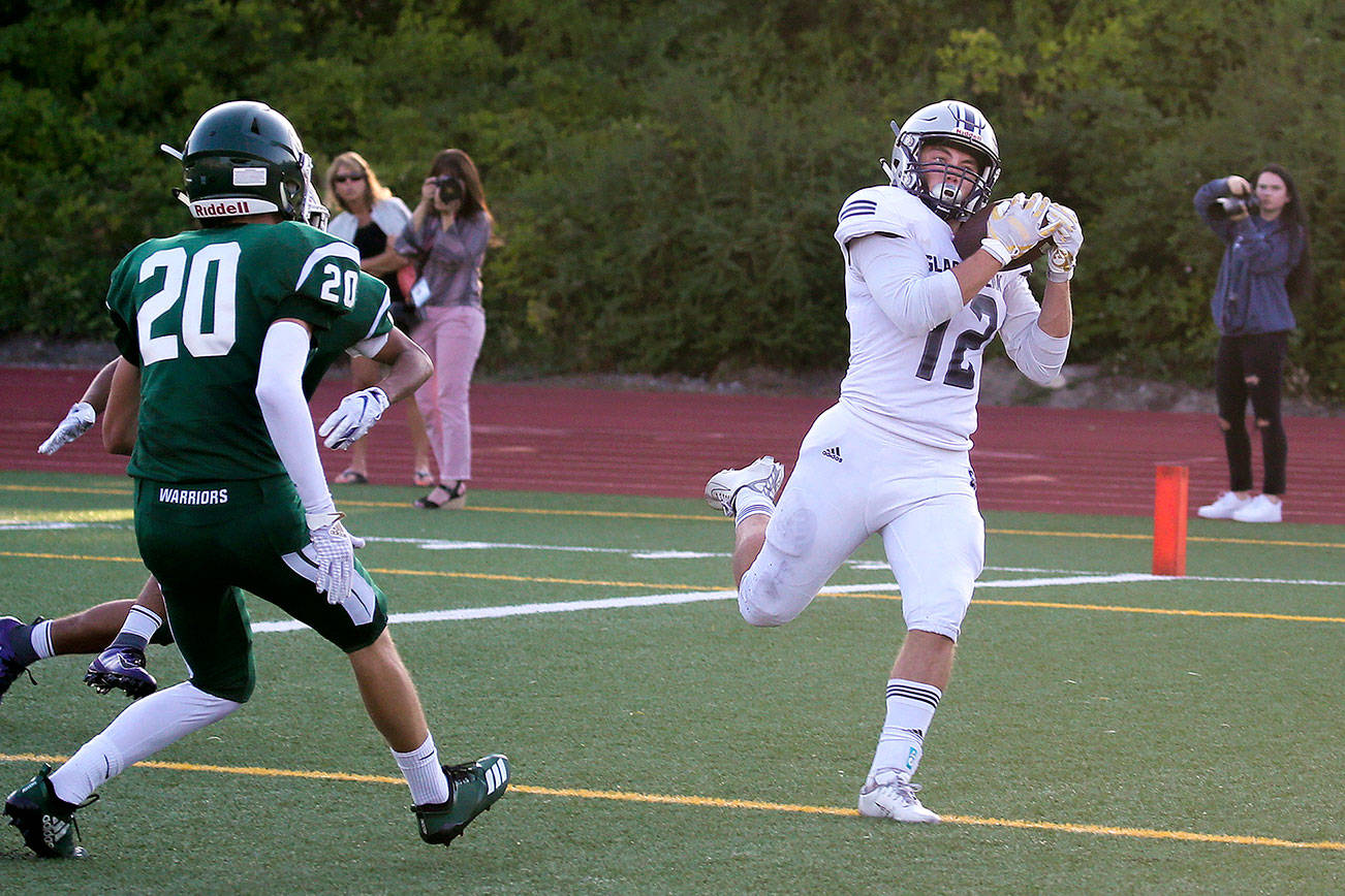 Glacier Peak’s Brayden Corwin hauls in a pass for a touchdown as Glacier Peak beat Edmonds-Woodway 35-14, in their season opening football game for both teams, at Edmonds Stadium on Friday, Sept. 6, 2019 in Edmonds, Wash. (Andy Bronson / The Herald)