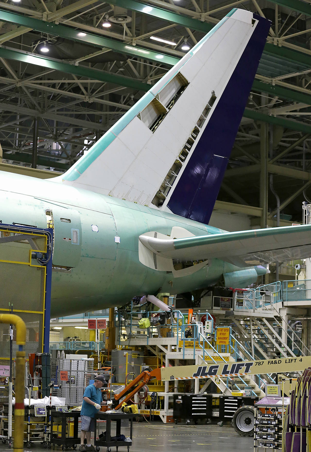 This 2017 photo shows a Boeing 777 airplane on the assembly line in Everett. (AP Photo/Ted S. Warren, file)