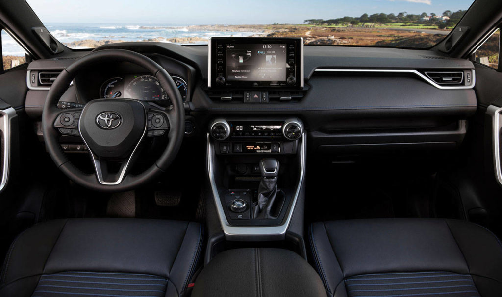 An 8-inch tablet-like touchscreen in the center dashboard highlights the 2019 Toyota RAV4 Hybrid interior. The XSE trim is shown here. (Manufacturer photo)
