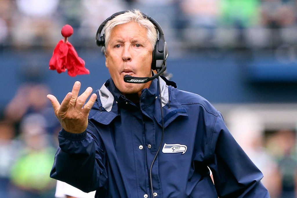 Pete Carroll, Seattle head coach, throws the challenge flag at CenturyLink Field Sunday afternoon in Seattle on September 8, 2019. The Seahawks won 21-20. (Kevin Clark / The Herald)
