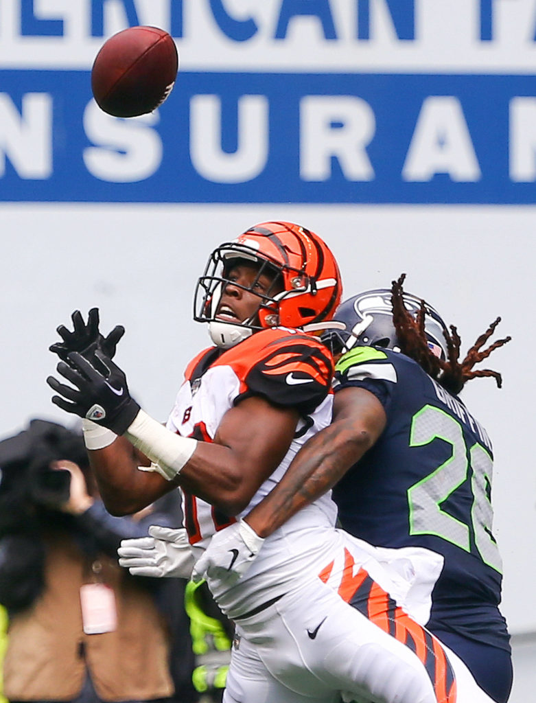 A pass intended for Cincinnati’s John Ross III is broken up by Seattle’s Shaquill Griffin at CenturyLink Field Sunday afternoon in Seattle on September 8, 2019. The Seahawks won 21-20. (Kevin Clark / The Herald)
