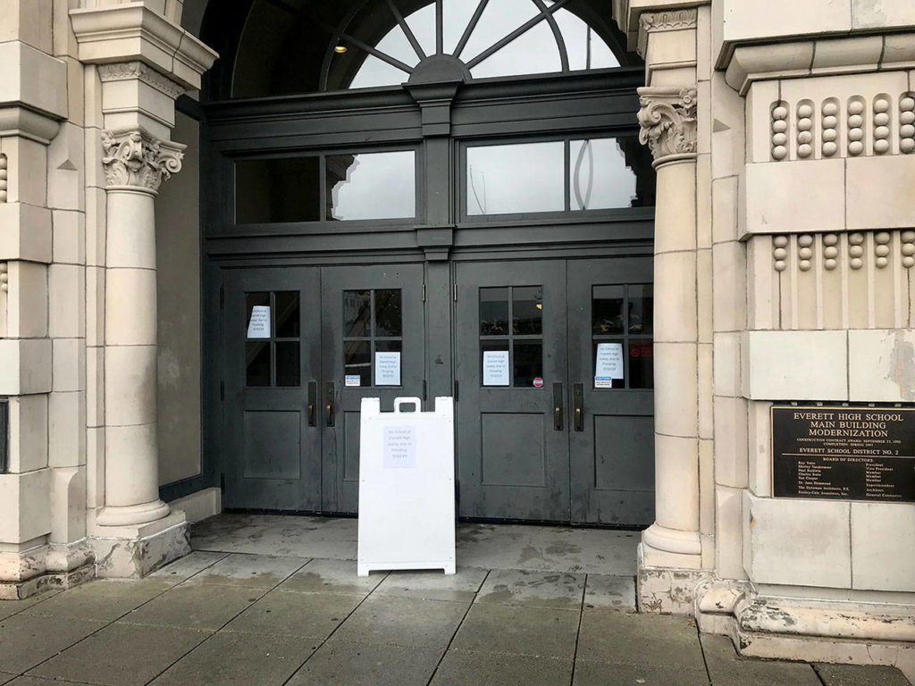Signs posted at Everett High School on Tuesday morning said “No school at Everett High today, due to flooding.” (Stephanie Davey / The Herald)
