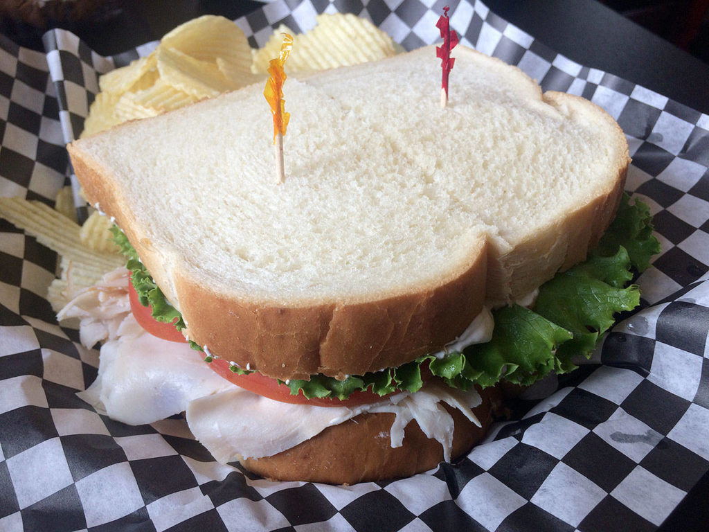 The Cookie Mill’s Snowbird Nester is made with smoked turkey, cream cheese, cranberry, lettuce, red onion and tomato. (Evan Thompson / The Herald)
