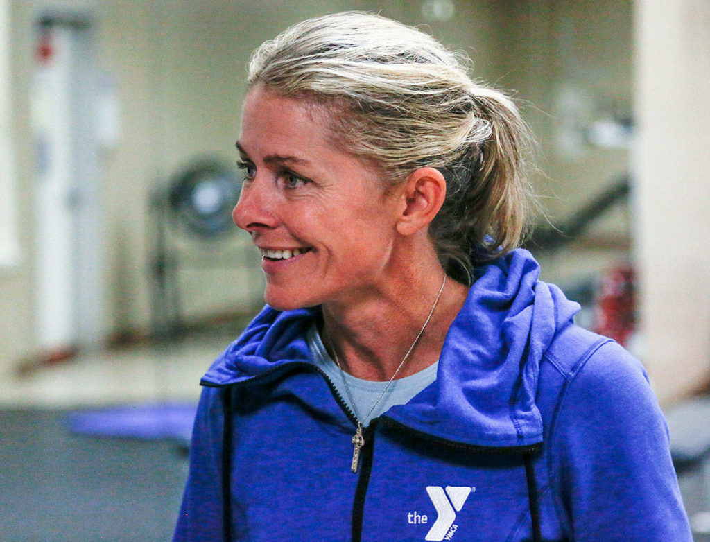 The Everett Y’s senior program director Gael Gebow is enthusiastic about the upcoming move to a new facility, and looks forward to a group walk to the new digs Saturday. (Dan Bates / The Herald)
