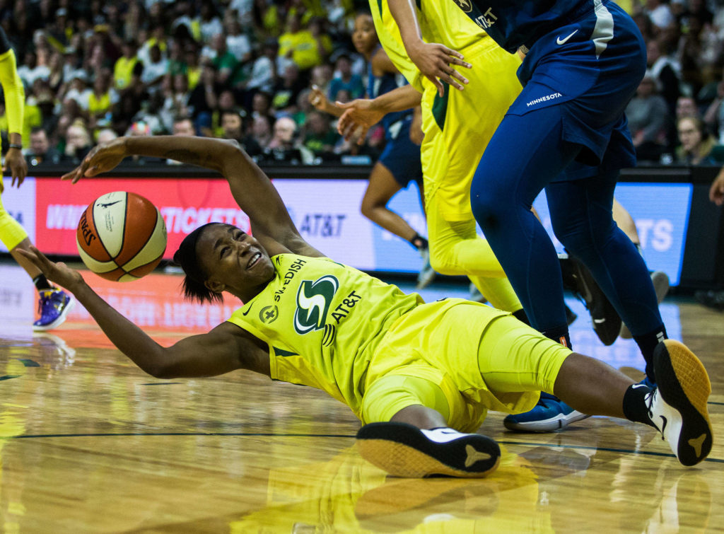 Seattle Storm’s Jewell Loyd scrambles for the ball during the game against the Minnesota Lynx on Wednesday, Sept. 11, 2019 in Everett, Wash. (Olivia Vanni / The Herald)