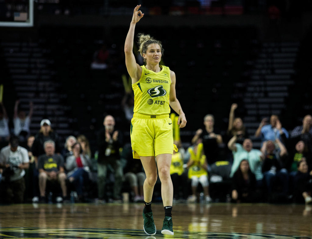 Seattle Storm’s Sami Whitcomb put up three finger after making a three point shot during the game against the Minnesota Lynx on Wednesday, Sept. 11, 2019 in Everett, Wash. (Olivia Vanni / The Herald)
