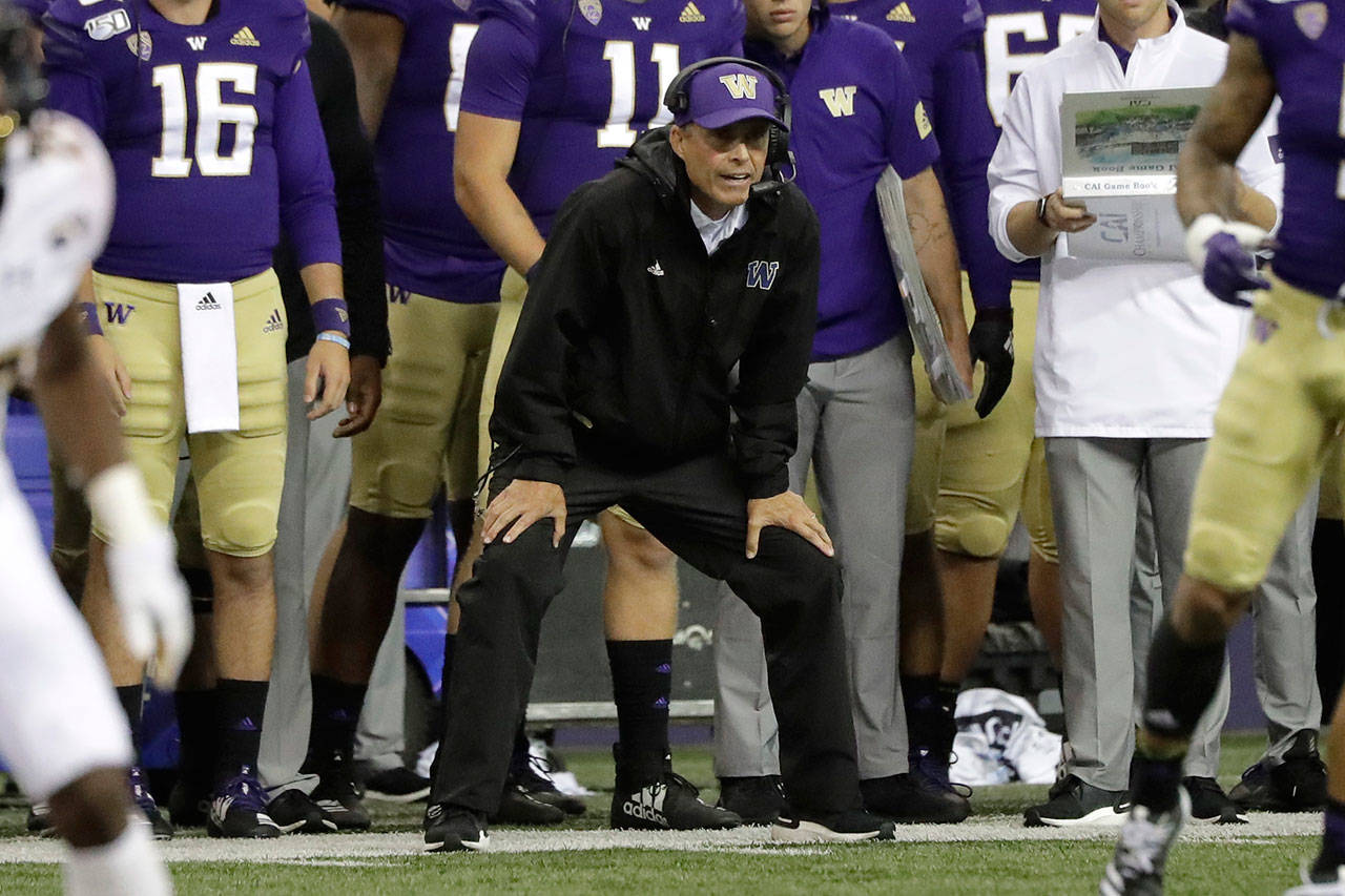 Washington head coach Chris Petersen watches from the sideline during a game against California this past weekend in Seattle. (AP Photo/Ted S. Warren)