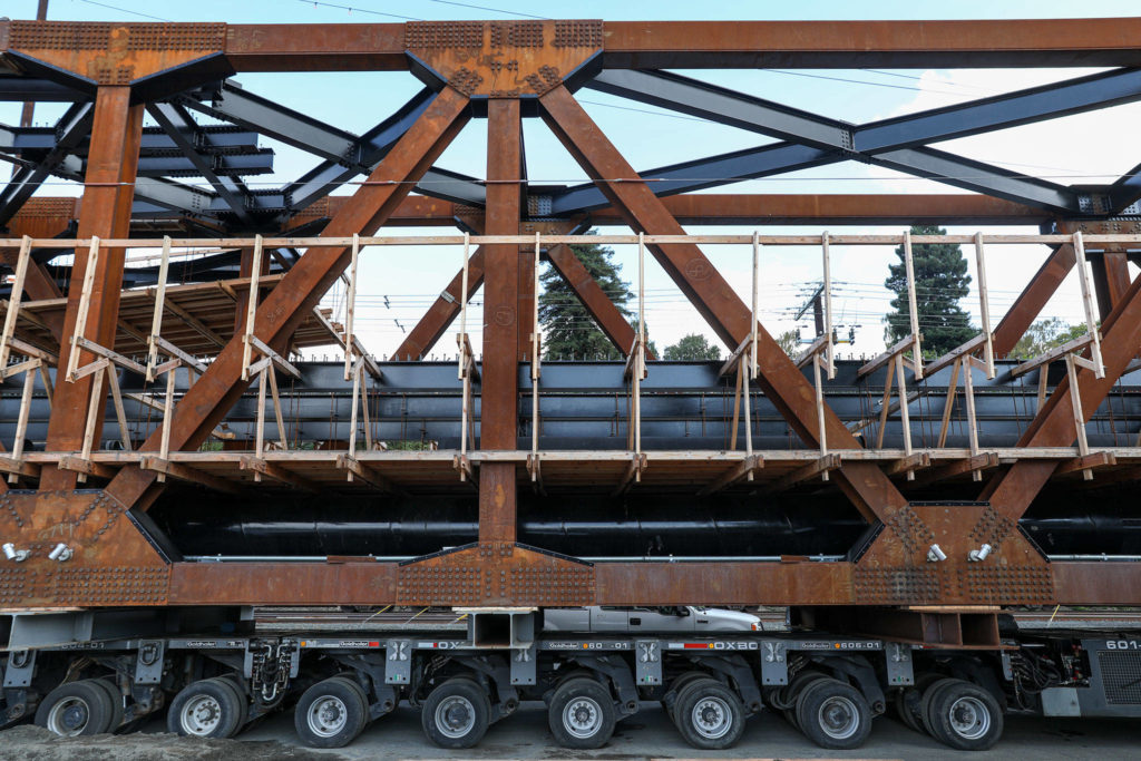 The Grand Avenue Park Bridge, assembled on-site, sits on the side of West Marine View Drive days before it’s set to be installed. (Lizz Giordano / The Herald)
