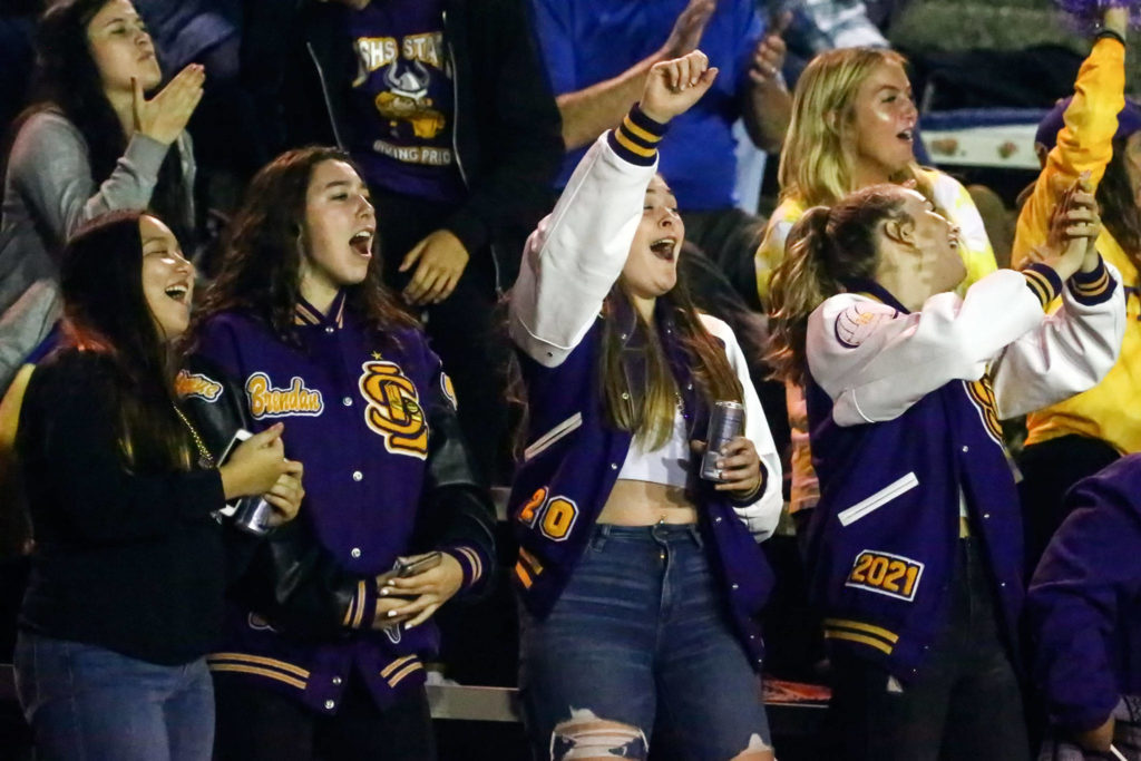 Vikings fans cheer the action on the field Friday night at Lincoln Bowl in Tacoma on September 13, 2019. Lake Stevens won 35-26. (Kevin Clark / The Herald)
