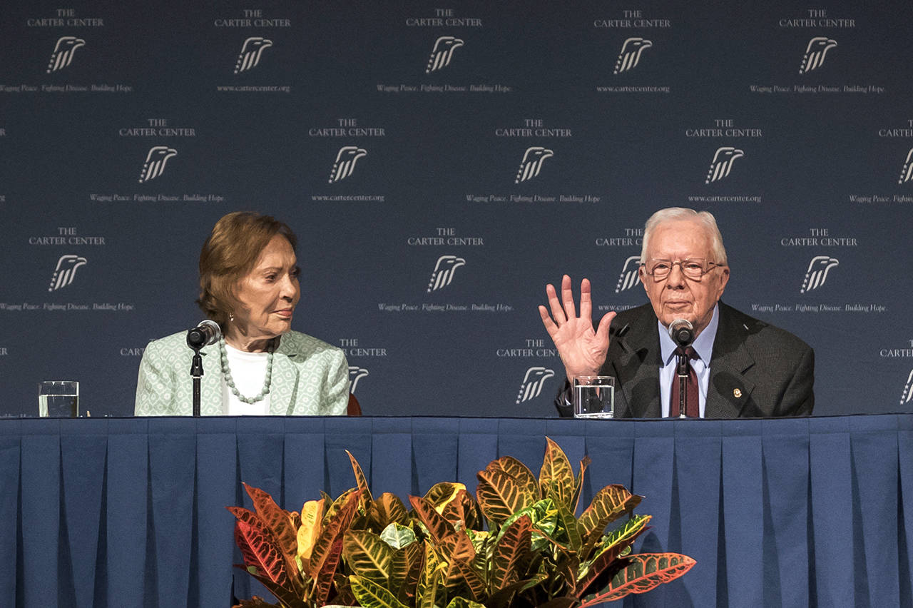 Former President Jimmy Carter and Rosalynn Carter talk about the future of The Carter Center and their global work during a town hall Tuesday in Atlanta. (Branden Camp/Atlanta Journal-Constitution via AP)