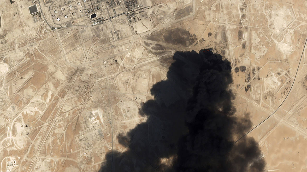 In this Sept. 14 photo, a satellite image from Planet Labs Inc. shows thick black smoke rising from Saudi Aramco’s Abqaiq oil processing facility in Buqyaq, Saudi Arabia. (Planet Labs Inc via AP, File)
