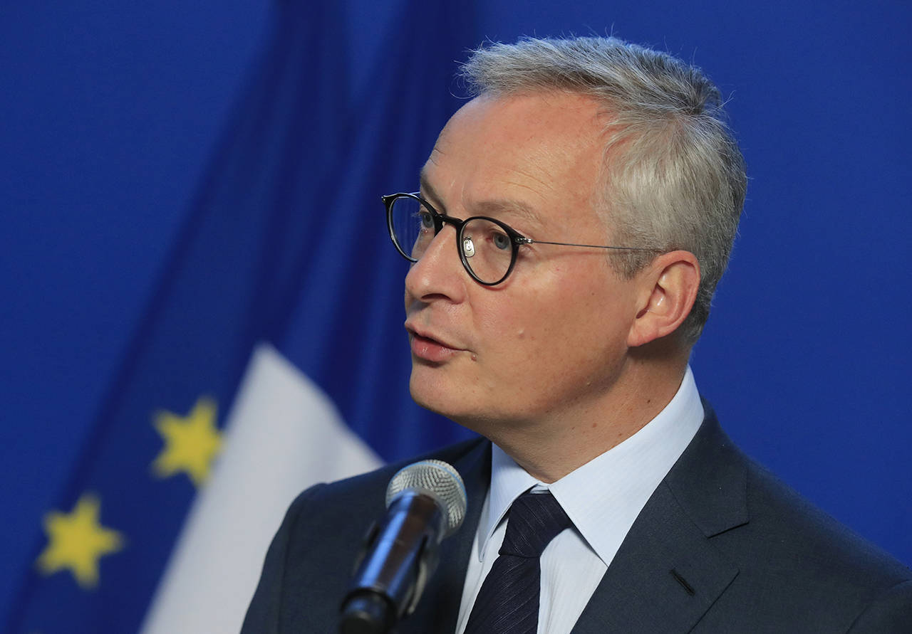 French Finance Minister Bruno speaks to the media after a meeting with representatives of the French petrol industry in Paris on Sept. 19. (AP Photo/Michel Euler)
