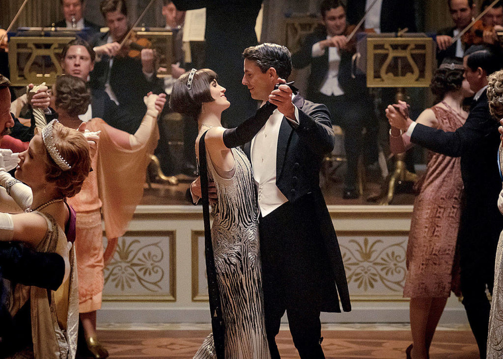 Ever a clotheshorse, Lady Mary Talbot (Michelle Dockery) dances with husband Henry (Matthew Goode) in “Downton Abbey.” (Focus Features)

