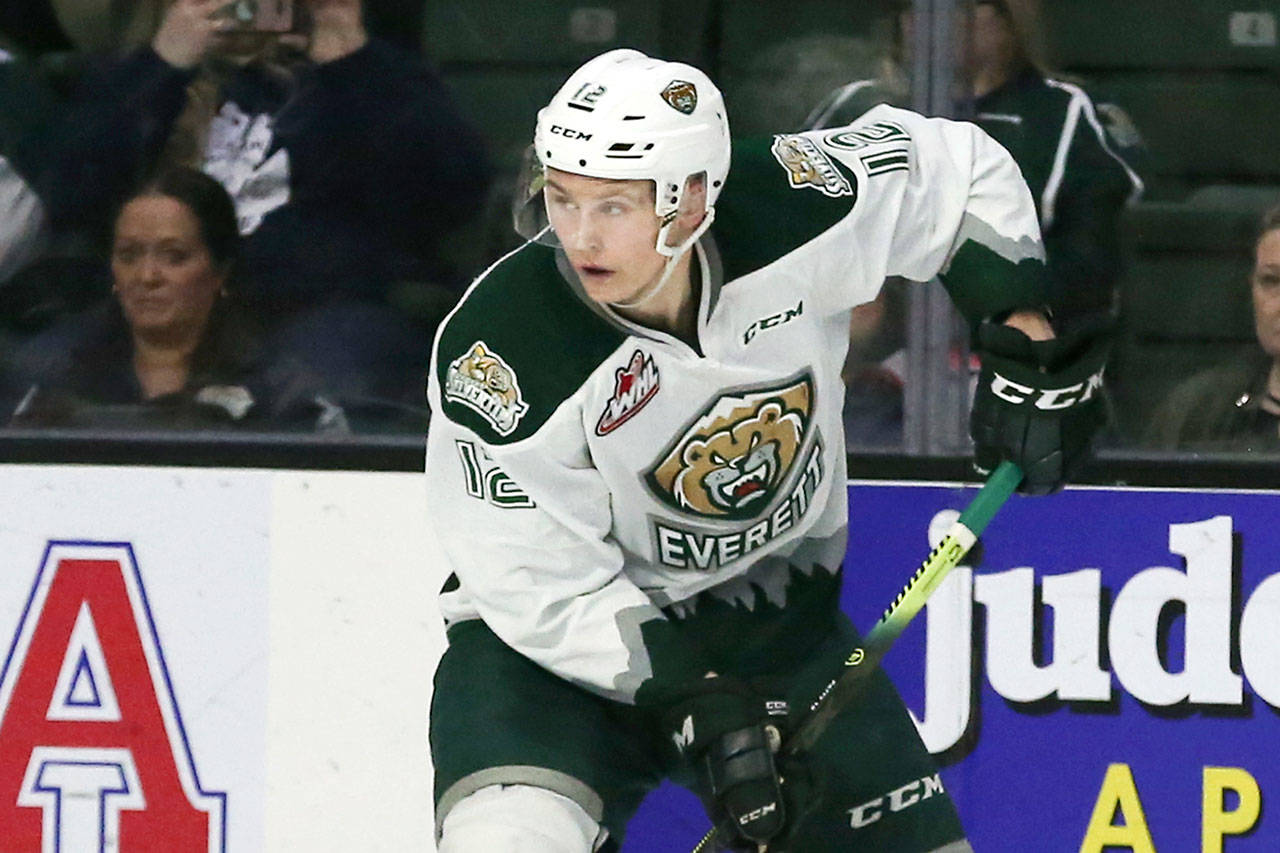 Everett’s Max Patterson controls the puck against the Tri-City Americans during the first game of the 2019 playoffs March 22 at Angel of the Arena in Everett. (Kevin Clark / The Herald)