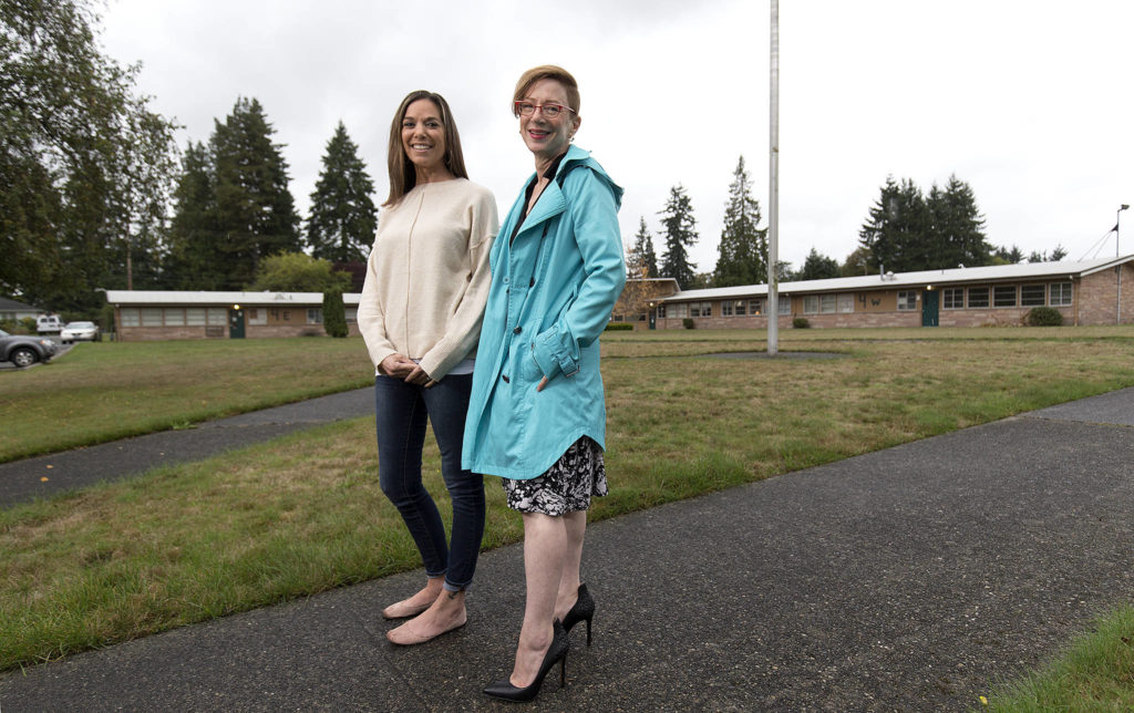 Compass Health’s Megan Boyle, left, director of intensive services for children, and Frances Wilder, director of Snohomish County outpatient services, at the campus on Federal Avenue in Everett. (Andy Bronson / The Herald)
