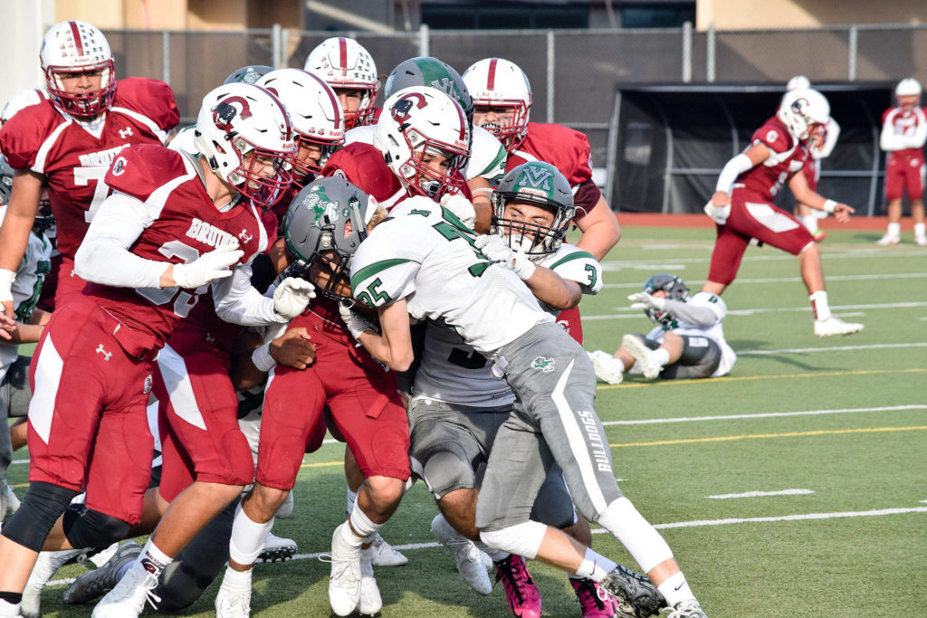 The Cascade offense pushes senior running back Davanta Murphy-Mcmillan into the end zone against Mount Vernon on Friday, Sept. 20 at Everett Memorial Stadium. (Katie Webber / The Herald)
