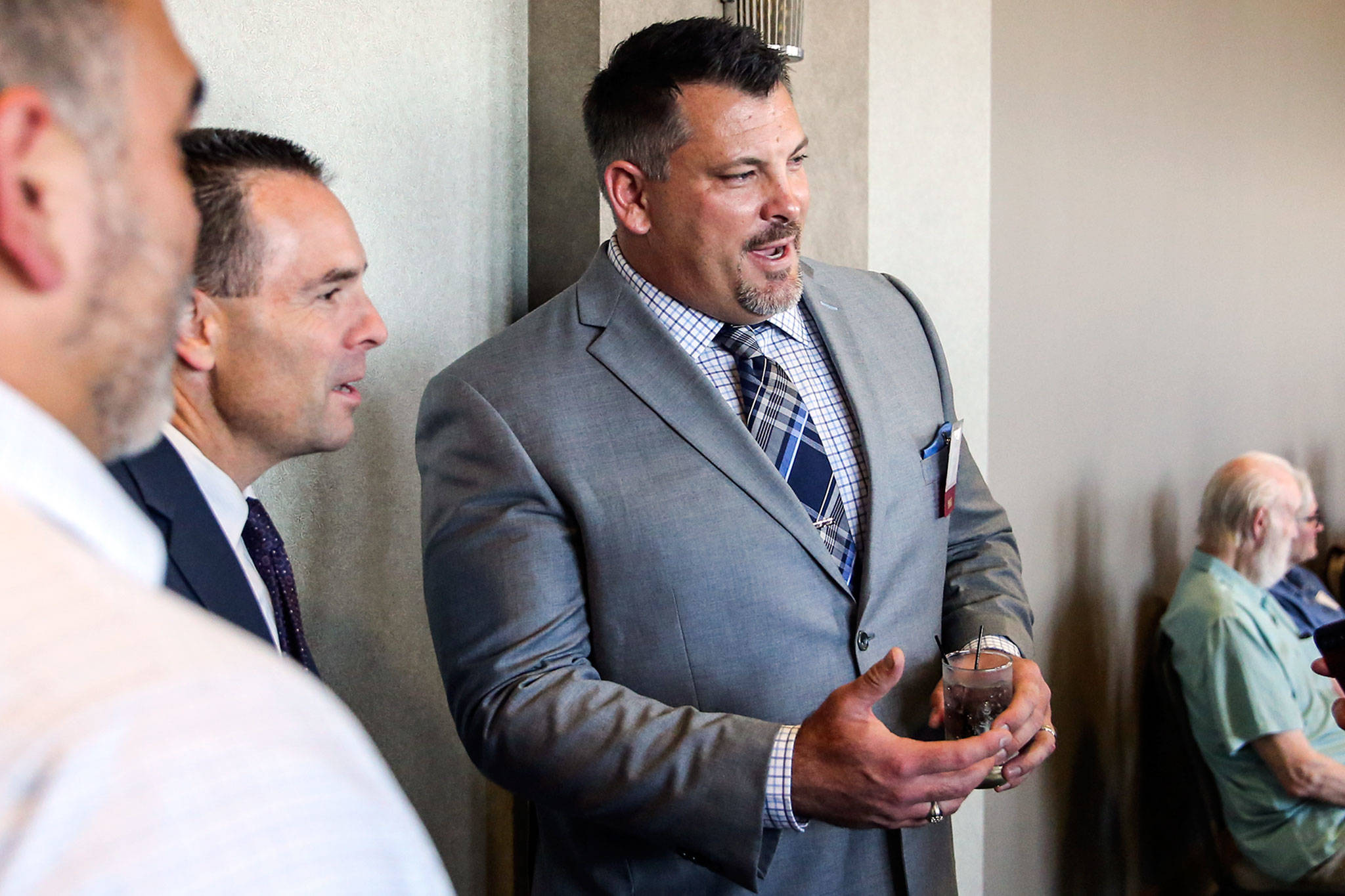 Jarred Rome speaks with attendees Wednesday during the 10th Annual Snohomish County Sports Hall of Fame Banquet at Angel of the Winds Arena in Everett. He said, “The support I had shows tonight from the family and friends who are here, without your support I would never be here.” (Kevin Clark / The Herald)