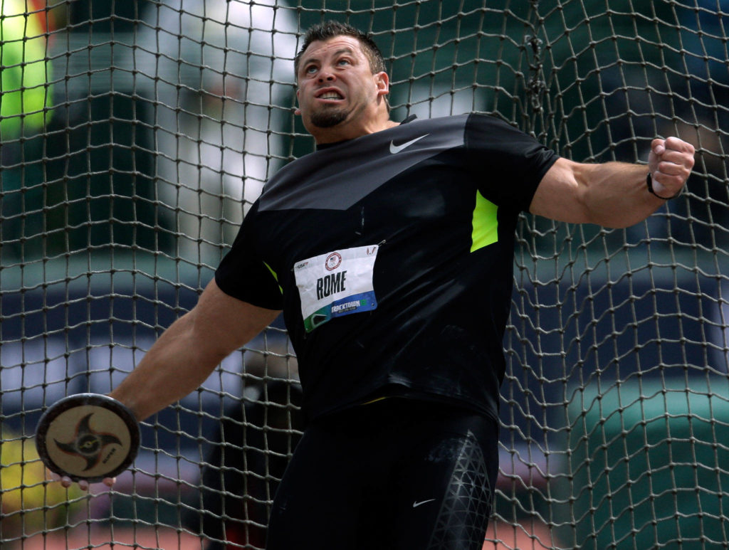 Jarred Rome throws during a qualifying round for the men’s discus at the U.S. Olympic Track and Field Trials on June 25, 2012, in Eugene, Ore. (AP Photo/Matt Slocum)
