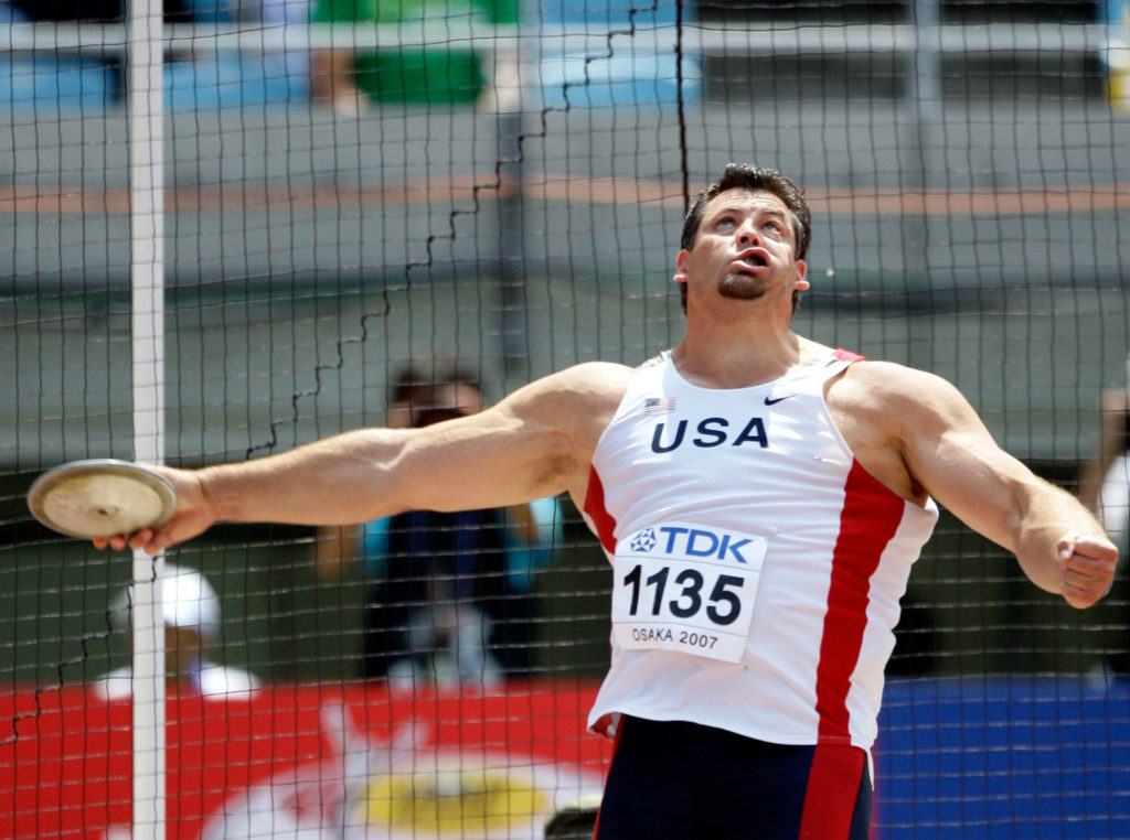 United States’ Jarred Rome makes an attempt during qualification for the men’s discus throw final at the World Athletics Championships on Aug. 26, 2007, in Osaka, Japan. (AP Photo/David J. Phillip)
