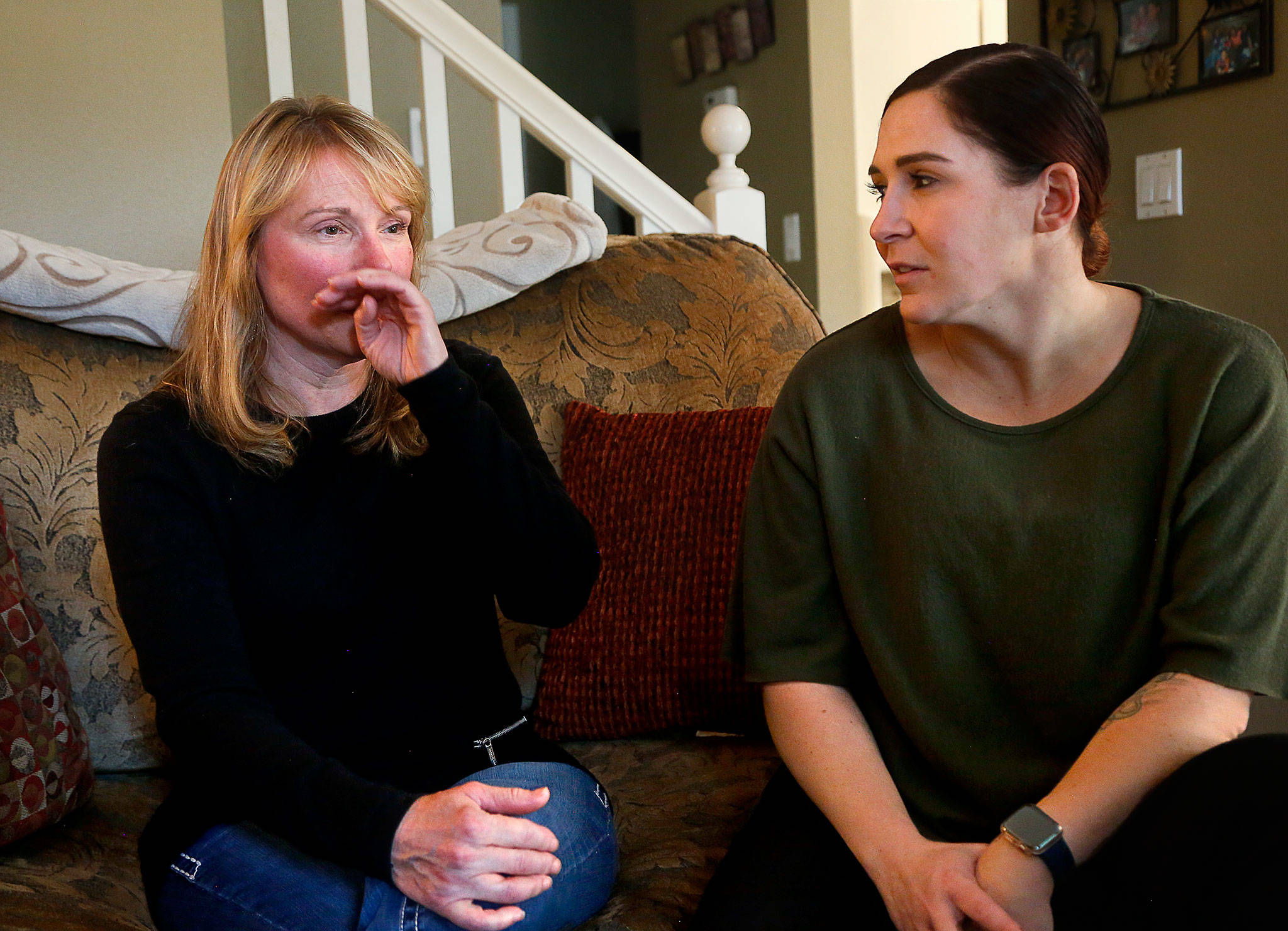 Bothell’s Susan Zahler, 59, and her daughter Alicia Lochrie, 33, (right) survived the Las Vegas shooting rampage that killed 58 people at a country-music festival on Oct. 1, 2017. The women have struggled with the aftereffects of what they saw, heard and survived. (Dan Bates / The Herald)