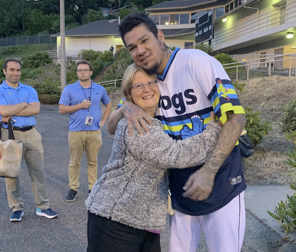 Kathy Chapman reconnects with Felix Hernandez following his rehab start in Everett in August. (Courtesy of Kathy Chapman)
