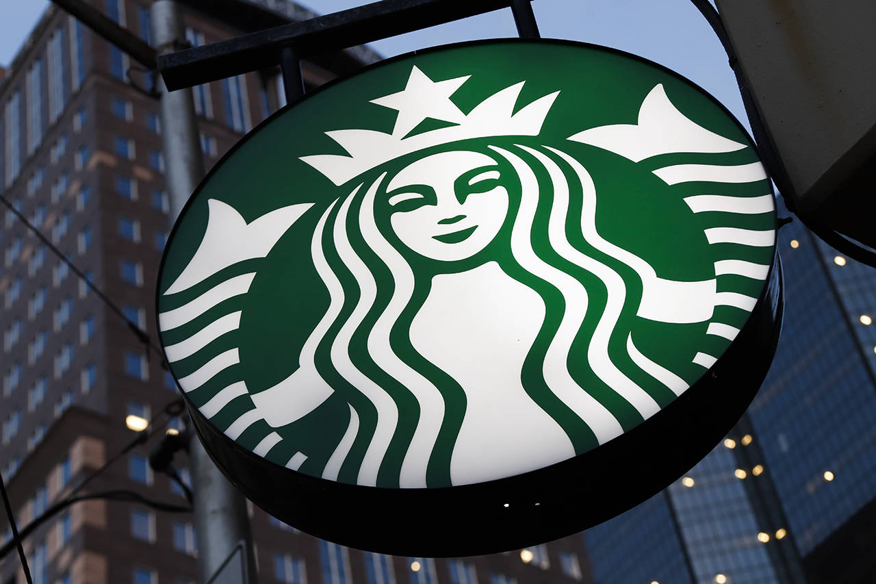 This June 26 photo shows a Starbucks sign outside a Starbucks coffee shop in downtown Pittsburgh. (AP Photo/Gene J. Puskar, File)