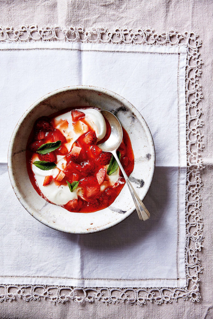Red, hot and cool strawberries are cooked down with chili pepper and served over a large dollop of cream cheese and yogurt. (Ola O. Smit)
