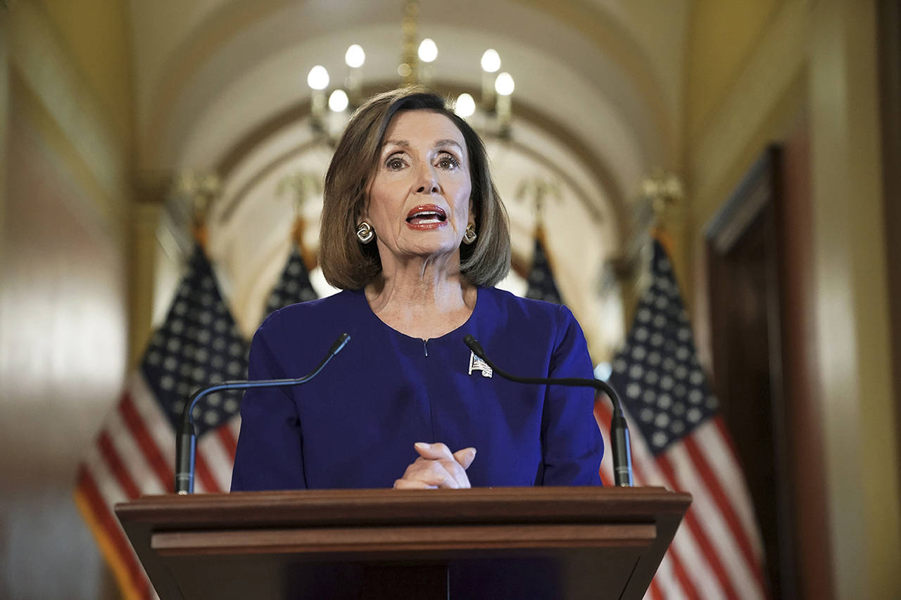 House Speaker Nancy Pelosi reads a statement announcing a formal impeachment inquiry into President Donald Trump, on Capitol Hill in Washington, on Tuesda. (AP Photo/Andrew Harnik)