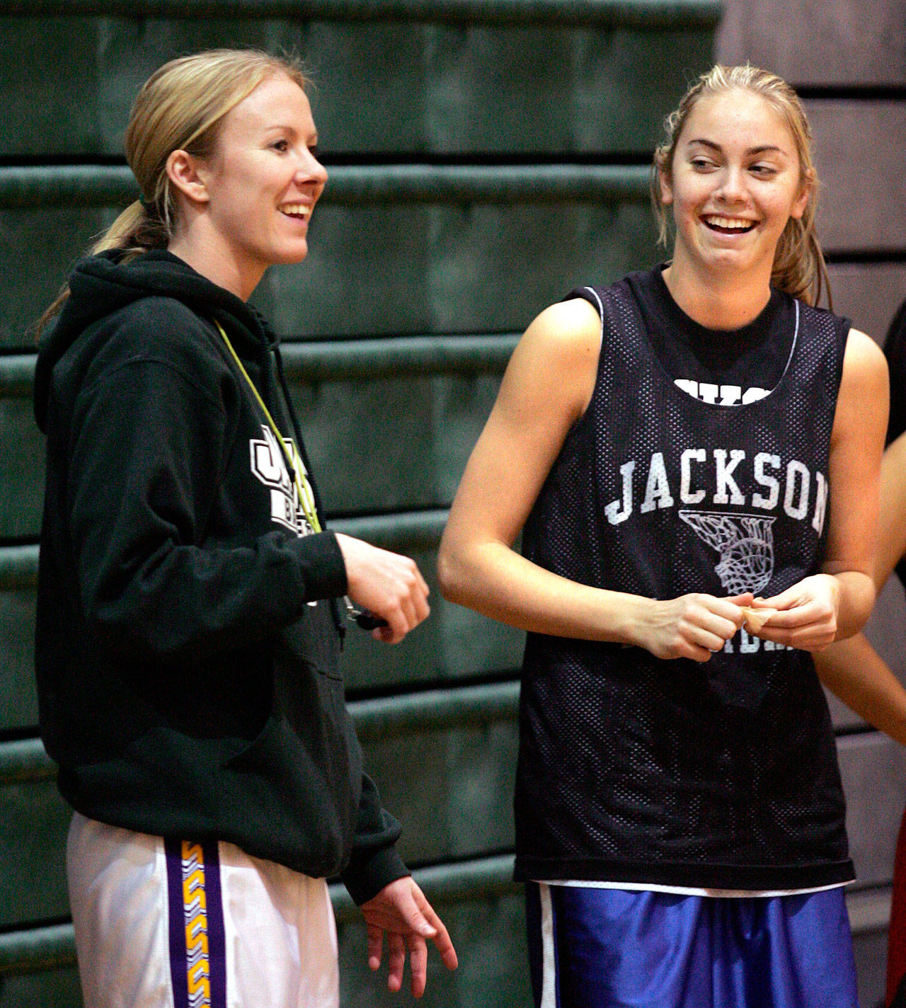 Jeannie Thompson (left) talks with Kristi Kingma during a Jackson High School practice in 2007. Thompson was hired as the head girls basketball coach at Everett this week. (Herald file)